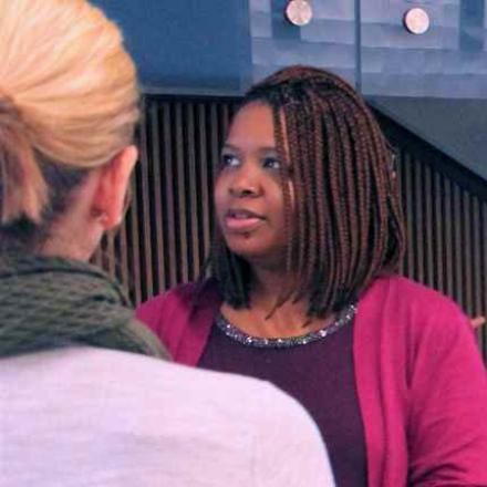 Anti-racism glossary 2 People Talking at an event