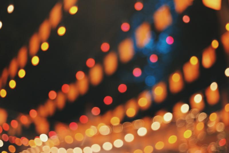 December 2021 Coaching Report A String of Lights against a dark night sky