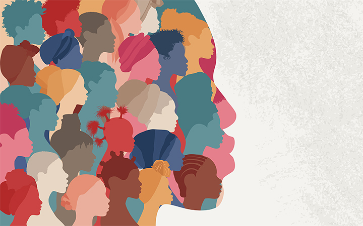 Woman face silhouette in profile with a group of African and African American women faces inside. Concept of racial equality antiracism and a woman who gives a voice to other women.